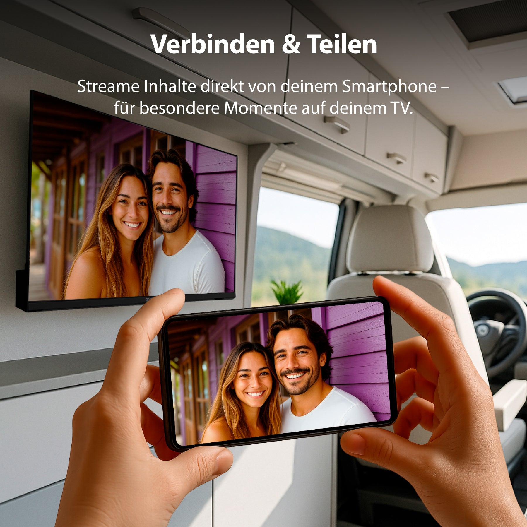 Eine Person streamt ein Foto von ihrem Smartphone auf einen an der Wand montierten Dyon Smart 24 VX-V Smart TV (24 Zoll, 60 cm) in einem modernen Fahrzeuginnenraum.