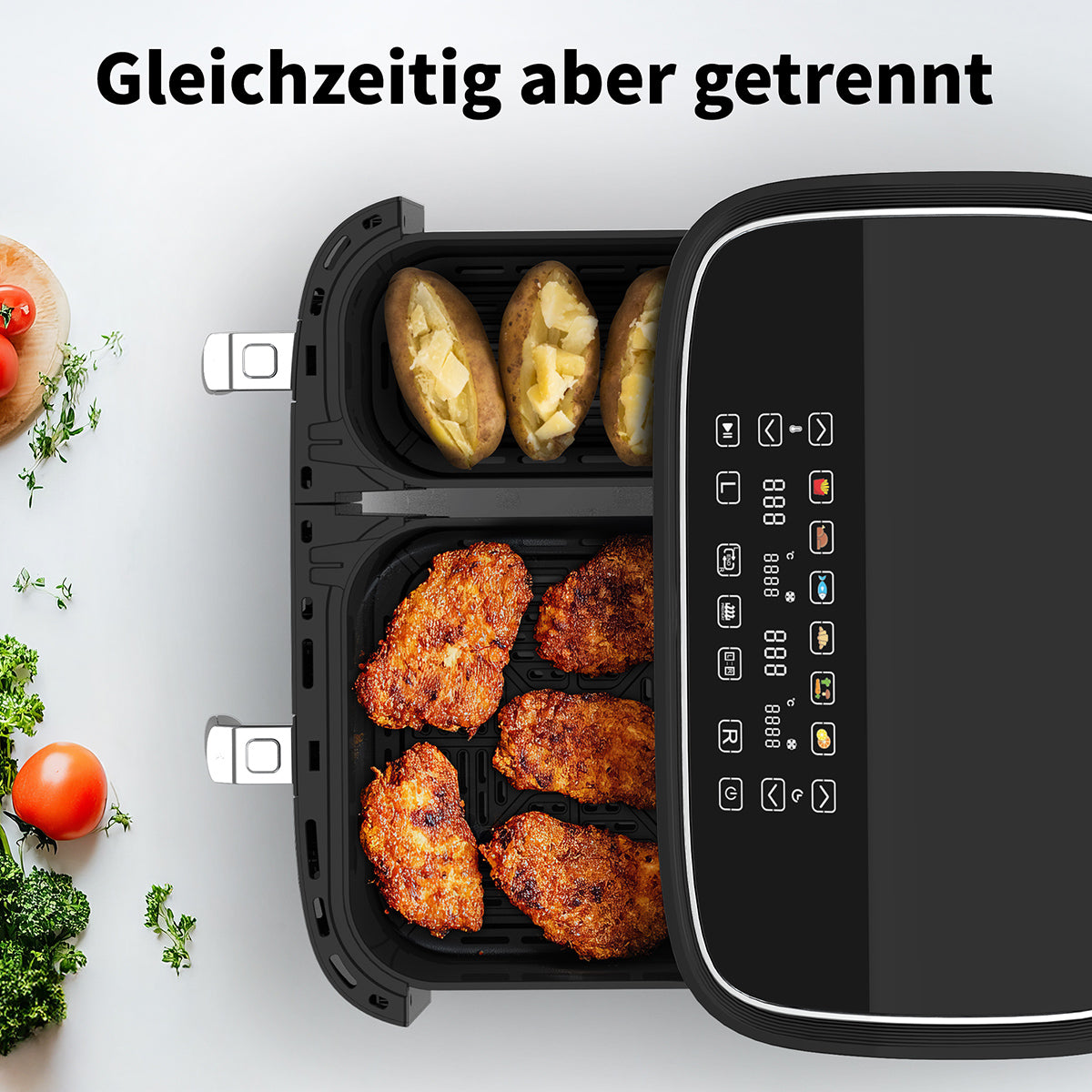 Draufsicht auf den aeco DUO Doppelkammer AirFryer 9 Liter mit Koch-SYNC Funktion, mit Bratkartoffeln und Brathähnchen in getrennten Fächern, darüber der Text "Gleichzeitig aber getrennt.