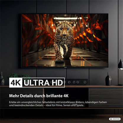 In einem modernen Wohnzimmer steht der DYON Ultimax 58U-TI, ein eleganter 58-Zoll-4K-UHD-Smart-TV von Samsung mit Tizen-Betriebssystem von Dyon und Gaming Hub, der ein scharfes Bild eines schreitenden Jaguars zeigt und damit seine atemberaubende 4K-Ultra-HD-Qualität unterstreicht.