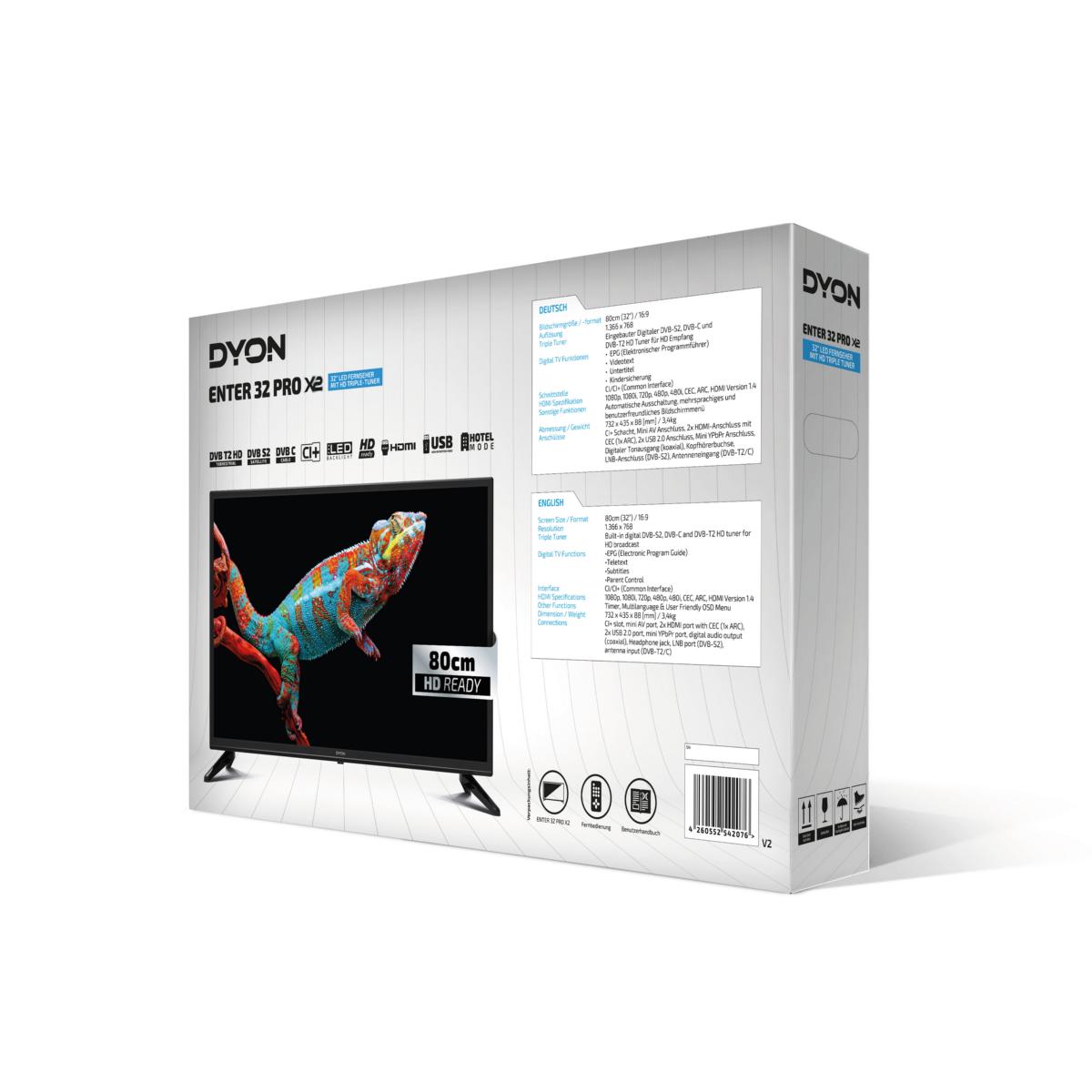 Verpackung eines Dyon Enter 32 Pro X2 32" LED-Fernsehers mit Merkmalen wie HD Triple Tuner, USB-Schnittstelle, technischen Daten und dem Bild einer Eidechse.