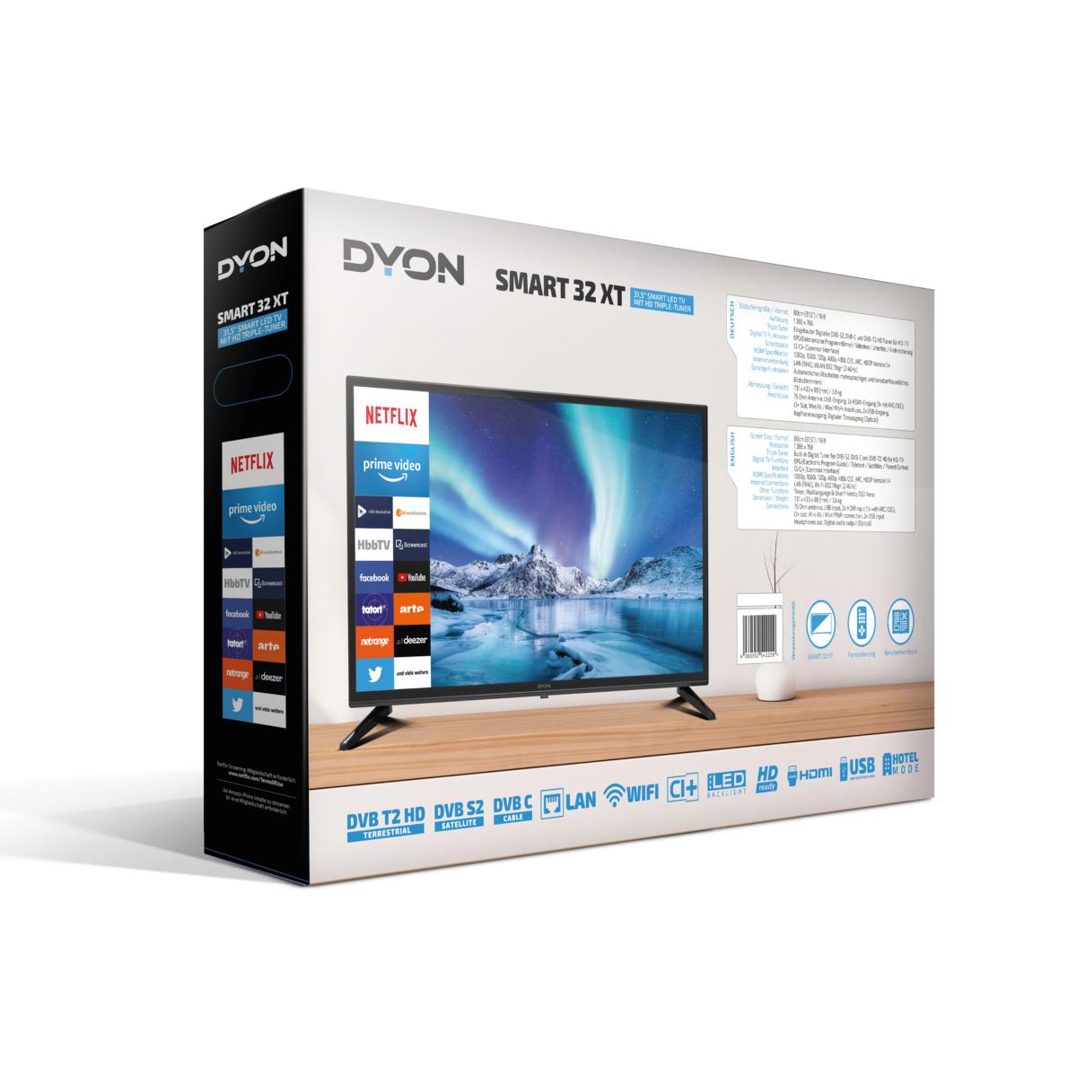Die Verpackung des Dyon Smart 32 XT HD TV zeigt den Bildschirm des Smart-Fernsehers mit den Logos von Netflix und Amazon Prime Video sowie die auf der Verpackung angegebenen Funktionen und Spezifikationen.