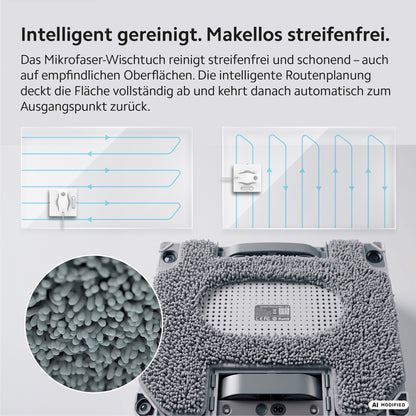 Nahaufnahme des HUTT W8 Fensterputzroboters bei der Reinigung einer Glasfläche mit seinem Mikrofasertuch, die streifenfreie Ergebnisse, eine smarte Fensterreinigung und eine intelligente Routenplanung demonstriert. Das doppelte Sprühsystem garantiert jedes Mal eine gründliche und effiziente Leistung.