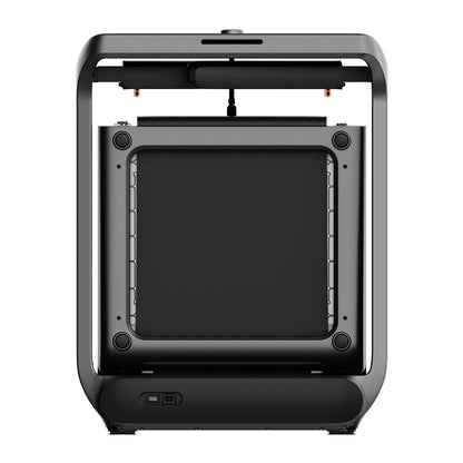 Eine Nahaufnahme eines geschlossenen 3D-Druckers, die die Bauplattform und internen Komponenten von vorne zeigt, ähnlich wie das Kingsmith WalkingPad X218 Klappbares Laufband seinen geräuschreduzierten Motor für intensives Training hervorhebt.