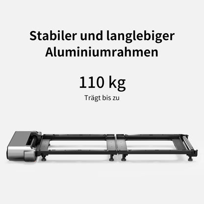 Das Kingsmith WalkingPad X214 Klappbares Laufband verfügt über einen schwarzen Aluminiumrahmen und ein motorisiertes Design, trägt bis zu 110 kg und ist mit deutschem Text hervorgehoben, der seine Haltbarkeit und Belastbarkeit als platzsparendes Fitnessgerät betont.