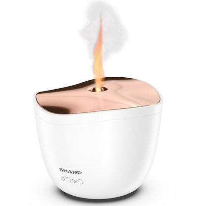 Der Sharp Ultraschall Aroma Zerstaeuber von Sharp gibt Nebel und ein flammenartiges Licht von oben ab und dient sowohl als Luftbefeuchter als auch als Diffusor für ätherische Öle zur Verbesserung Ihrer Aromatherapie.